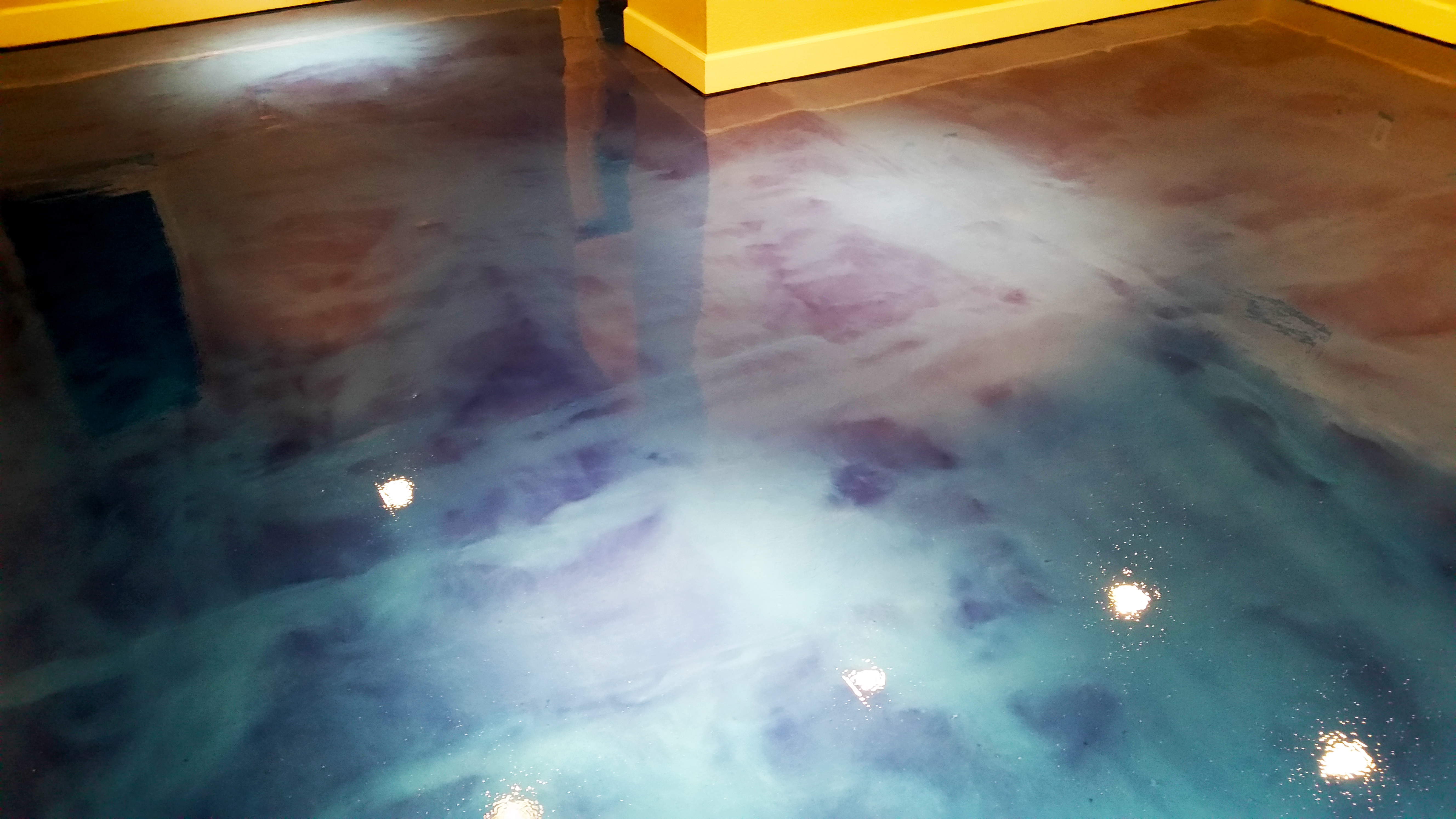 Blue concrete flooring in Denver- Zenith Painting and Coatings