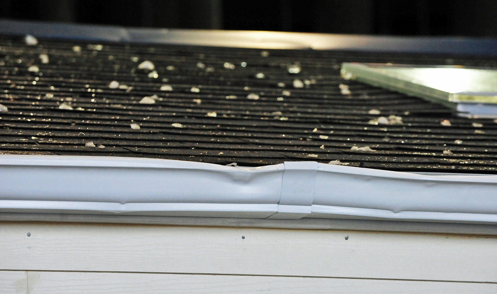 Hail damage on gutter