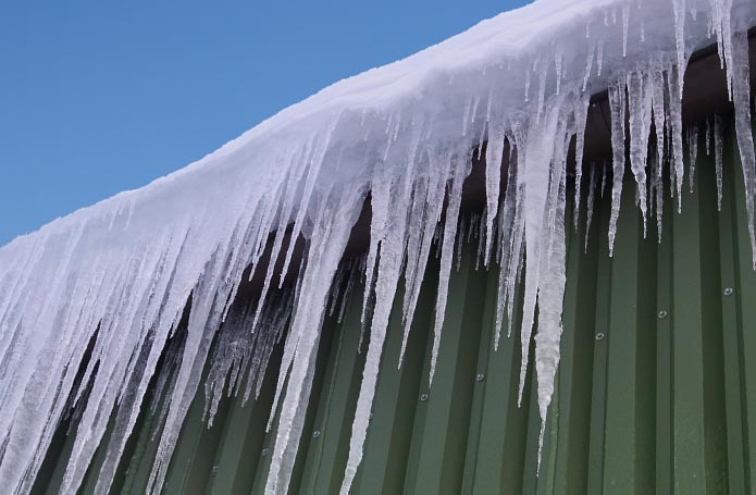 Ice on roof prior to ice removal service